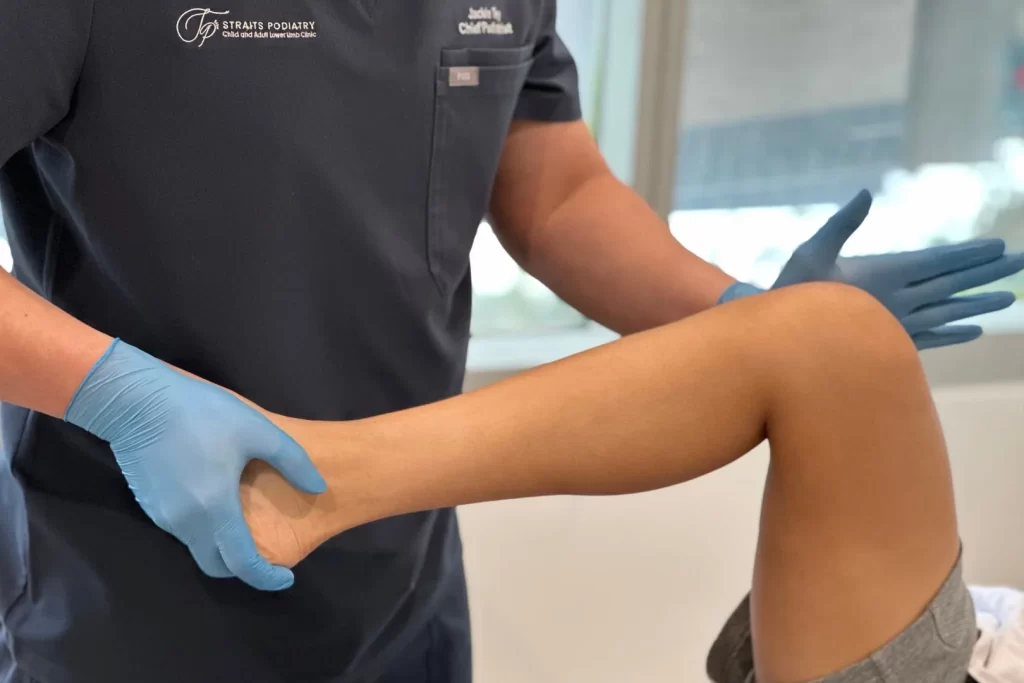 podiatrist assessment of patient with knee pain