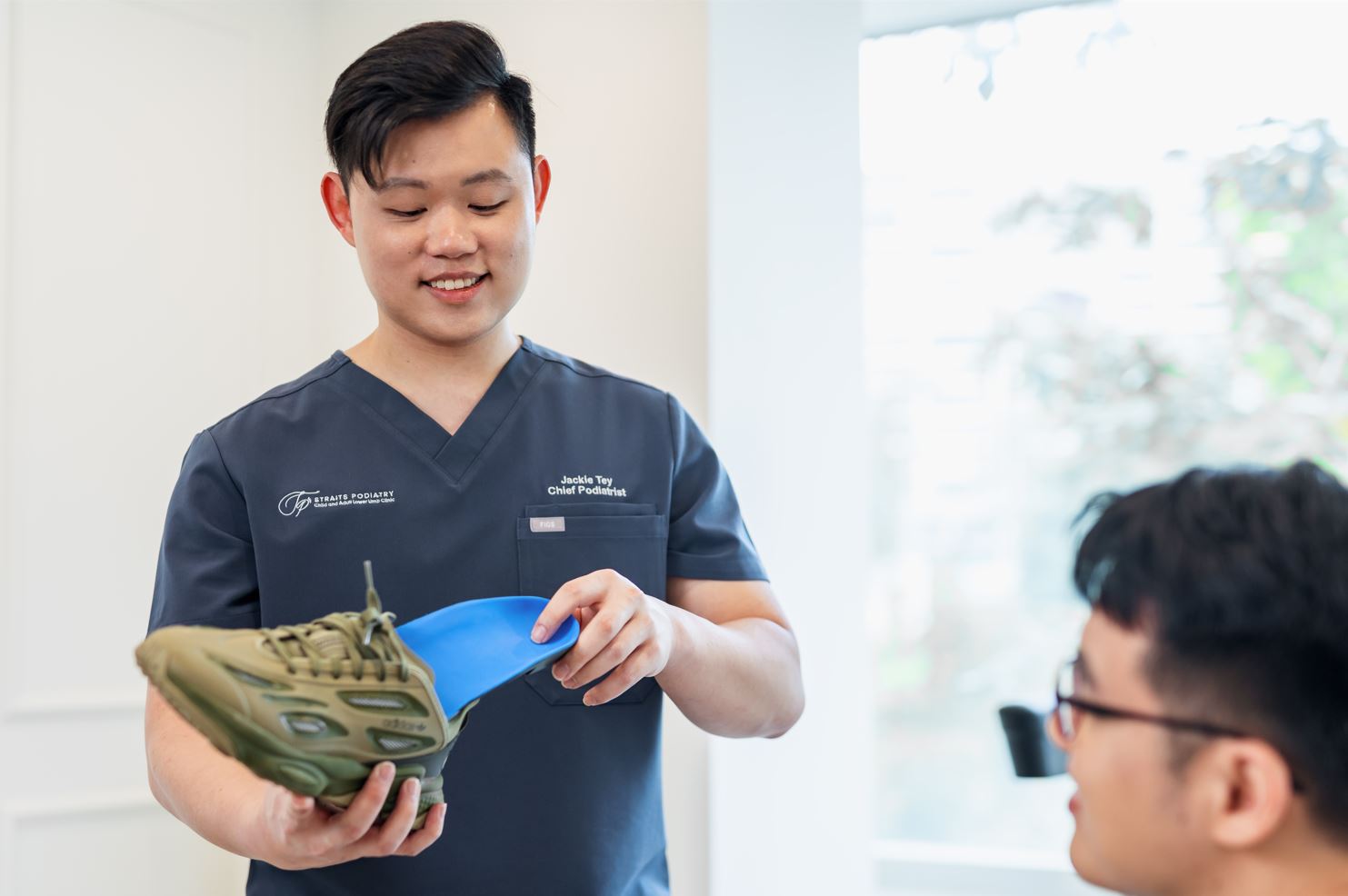 foot specialist in Singapore fitting custom insoles