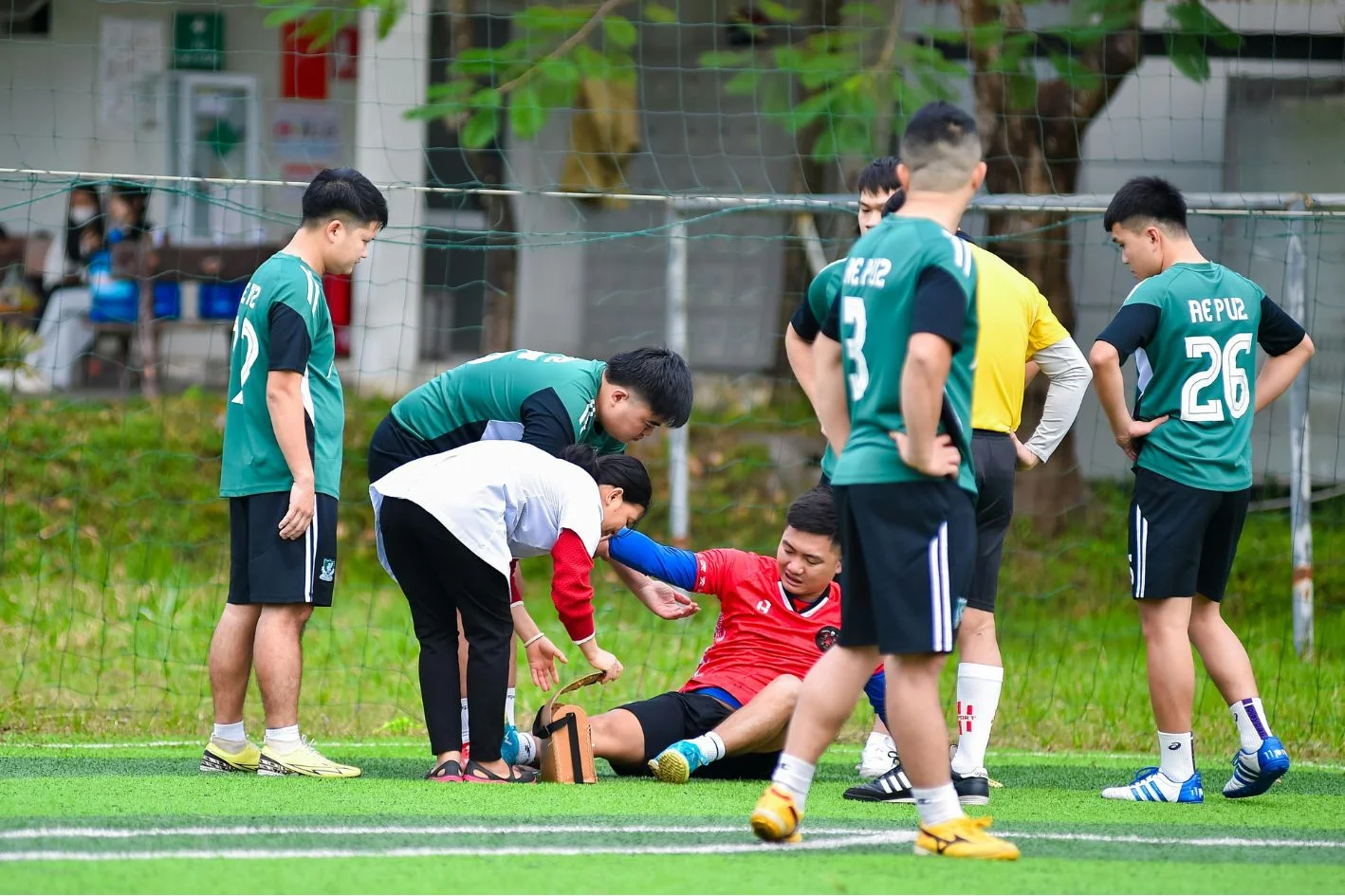 football player suffering foot injury during football